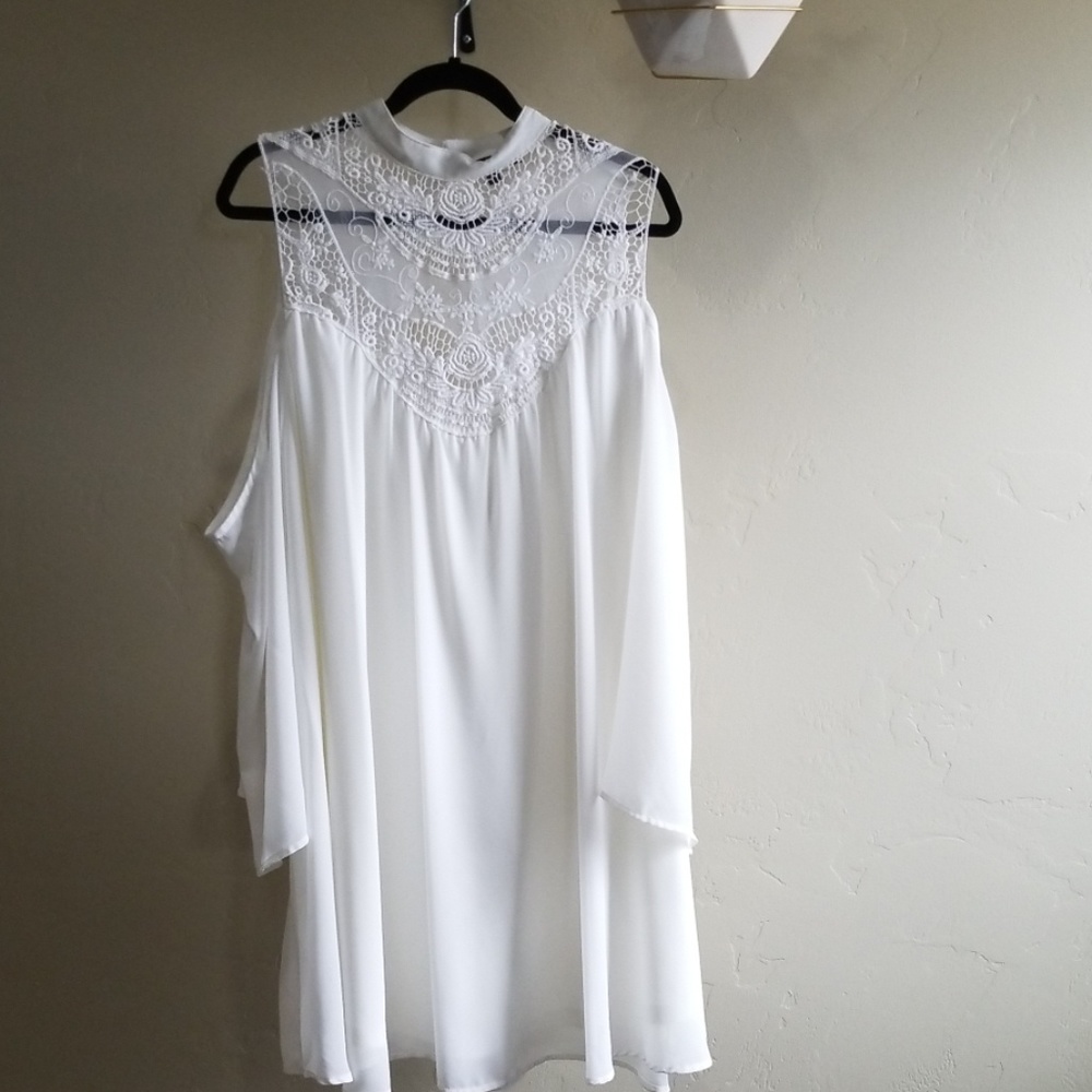 White flowy knee length dress